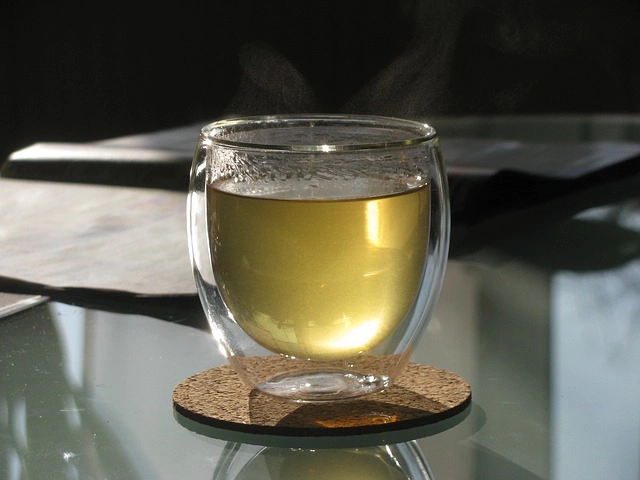 hot lemon water in a clear glass